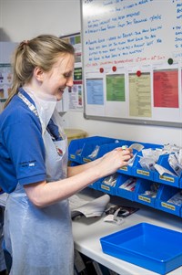 Staff in store room